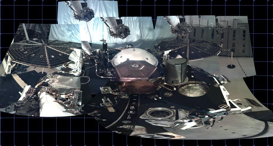 This panorama, created from multiple images, shows the deck of NASA's InSight lander, as well as its solar panels, during the assembly, test and launch operations phase at Lockheed Martin Space, Denver. The panorama, which uses images from InSight's Instrument Deployment Camera on its robotic arm, is a cylindrical projection.   https://photojournal.jpl.nasa.gov/catalog/PIA22826