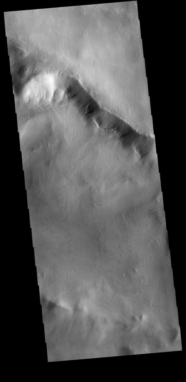 Multiple gullies dissect the rim of this unnamed crater in Terra Cimmeria.  Orbit Number: 74480 Latitude: -49.7019 Longitude: 140.533 Instrument: VIS Captured: 2018-09-28 22:24  https://photojournal.jpl.nasa.gov/catalog/PIA22850