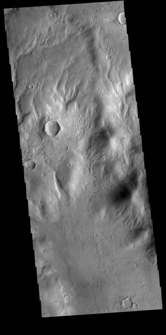 Today's VIS image shows several small channels. These channels are along the break in topography, that leads down into Argyre Planitia. Argyre Planitia and Hellas Planitia are deep basins in the southern hemisphere. Orbit Number: 74586 Latitude: -34.8073 Longitude: 318.916 Instrument: VIS Captured: 2018-10-07 16:02 https://photojournal.jpl.nasa.gov/catalog/PIA22857