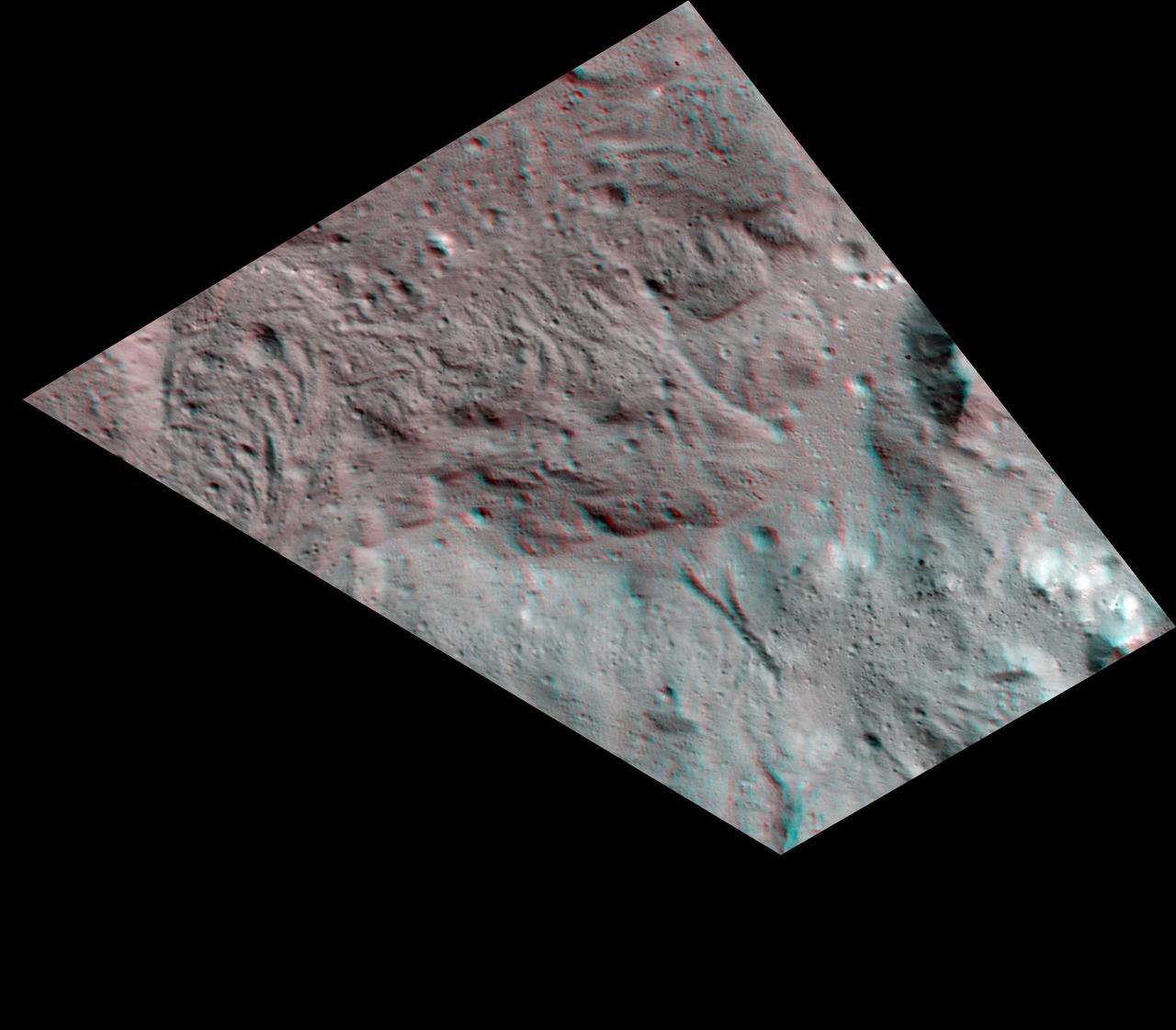 Scientists created this stereo view, called an anaglyph, with two images of the same part of Ceres's surface taken by Dawn on different orbits and from different viewing angles. The images were artificially colored and combined so that when viewed through glasses with a red filter on the left and blue on the right, they provide a 3-D view. The images used in this anaglyph were obtained by NASA's Dawn spacecraft from an altitude of about 38 miles (61 kilometers). The center of this image is located at about 22.3 degrees north latitude and 240.3 degrees east longitude. https://photojournal.jpl.nasa.gov/catalog/PIA22865