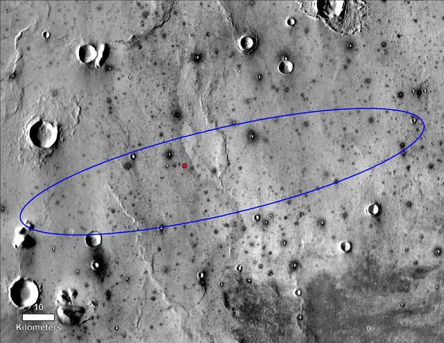 The red dot marks the final landing location of NASA's InSight lander in this annotated image of the surface of Mars, taken by the THEMIS camera on NASA's 2001 Mars Odyssey orbiter in 2015.  A version with latitude and longitude is also available.  The landing ellipse on this map covers an area within which the spacecraft had about a 99 percent chance of landing when targeted for the center of the ellipse. It is about 81 miles (130 kilometers) long, generally west to east, and about 17 miles (27 kilometers) wide.  The base map is a mosaic of daytime thermal images from the Thermal Emission Imaging System (THEMIS) on NASA's Mars Odyssey orbiter. THEMIS was developed and is operated by Arizona State University, Tempe.  https://photojournal.jpl.nasa.gov/catalog/PIA22878