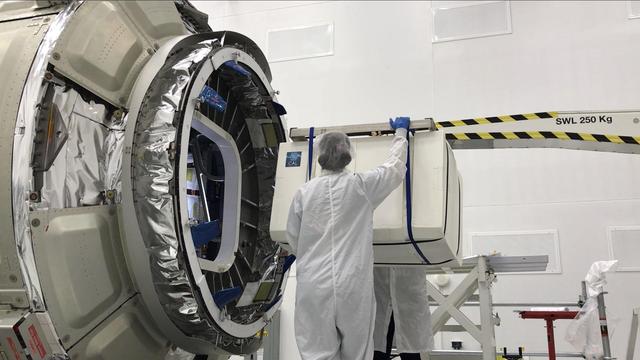 The Cold Atom Laboratory (CAL), packaged in a protective layer, is loaded onto a Northrop Grumman (formerly Orbital ATK) Cygnus spacecraft for its trip to the International Space Station. The facility launched in May 2018 from NASA's Wallops Flight Facility in Virginia. https://photojournal.jpl.nasa.gov/catalog/PIA22919