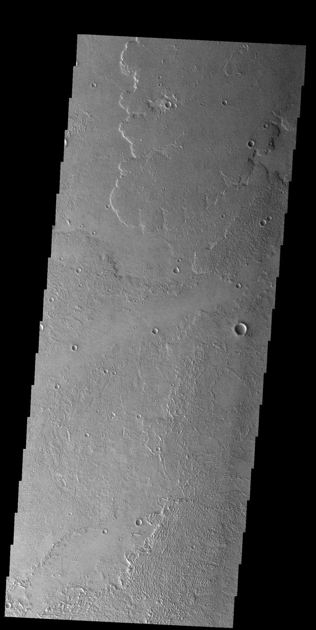 Today's VIS image shows a small portion of the immense lava flows that originated from Arsia Mons. Arsia Mons is the southernmost of the three large aligned volcanoes in the Tharsis region. Arsia Mons last eruption was 10s of million years ago. The youngest volcano in the region is Olympus Mons, the largest volcano in our solar system.  Orbit Number: 74945 Latitude: -18.9808 Longitude: 225.731 Instrument: VIS Captured: 2018-11-06 05:00  https://photojournal.jpl.nasa.gov/catalog/PIA22973