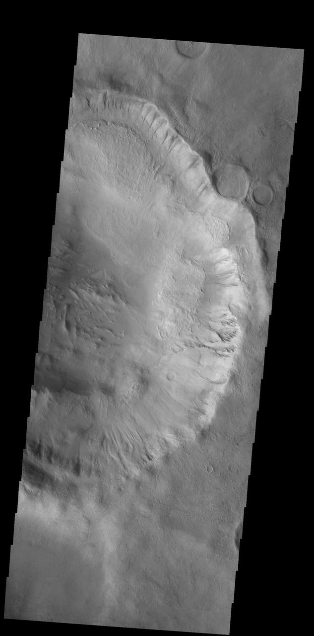 Many large gullies dissect the rim of this unnamed crater in Aonia Terra.  Orbit Number: 75019 Latitude: -46.9827 Longitude: 245.827 Instrument: VIS Captured: 2018-11-12 07:26  https://photojournal.jpl.nasa.gov/catalog/PIA22998