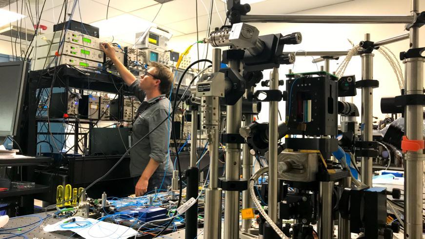 Cold Atom Laboratory (CAL) physicist David Aveline works in the CAL test bed, which is a replica of the CAL facility that stays on Earth. Scientists use the test bed to run tests and understand what is happening inside CAL while it is operating on the International Space Station.  https://photojournal.jpl.nasa.gov/catalog/PIA23001