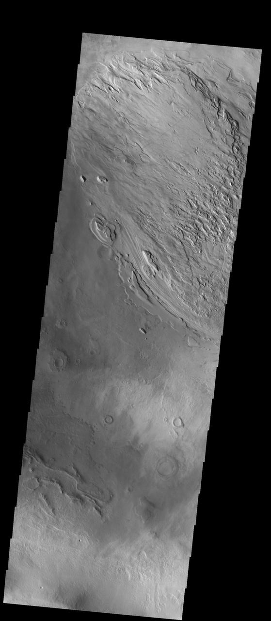 This VIS image shows part of the floor of Spallanzani Crater. At some point after the crater was created the floor was covered by a fill material. The material was laid down in layers, which are easily identifiable at the eroded margins of the desposit. Spallanzani Crater is located near the southeast margin of Hellas Planitia in Promethei Terra.  Orbit Number: 75249 Latitude: -58.0904 Longitude: 86.3064 Instrument: VIS Captured: 2018-12-01 06:07  https://photojournal.jpl.nasa.gov/catalog/PIA23025