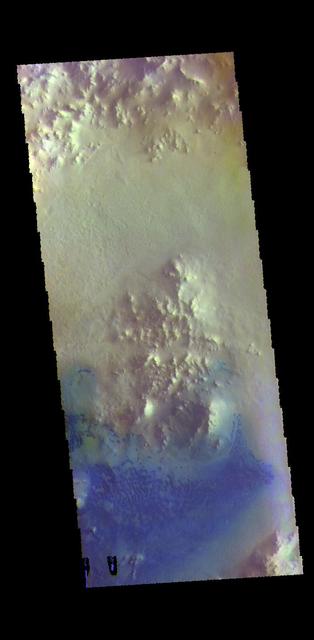 This VIS image shows the floor of an unnamed crater in Arabia Terra. The peaks in the center of the crater floor were formed by the rebound of melted rock at the time of the impact. There are individual sand dunes in the southern half of the crater. The dark blue tone in this filter combination indicates that the dunes are made of basaltic sand. The THEMIS VIS camera contains 5 filters. The data from different filters can be combined in multiple ways to create a false color image. These false color images may reveal subtle variations of the surface not easily identified in a single band image. Orbit Number: 60976 Latitude: 10.0004 Longitude: 8.21209 Instrument: VIS Captured: 2015-09-12 12:29 https://photojournal.jpl.nasa.gov/catalog/PIA23054
