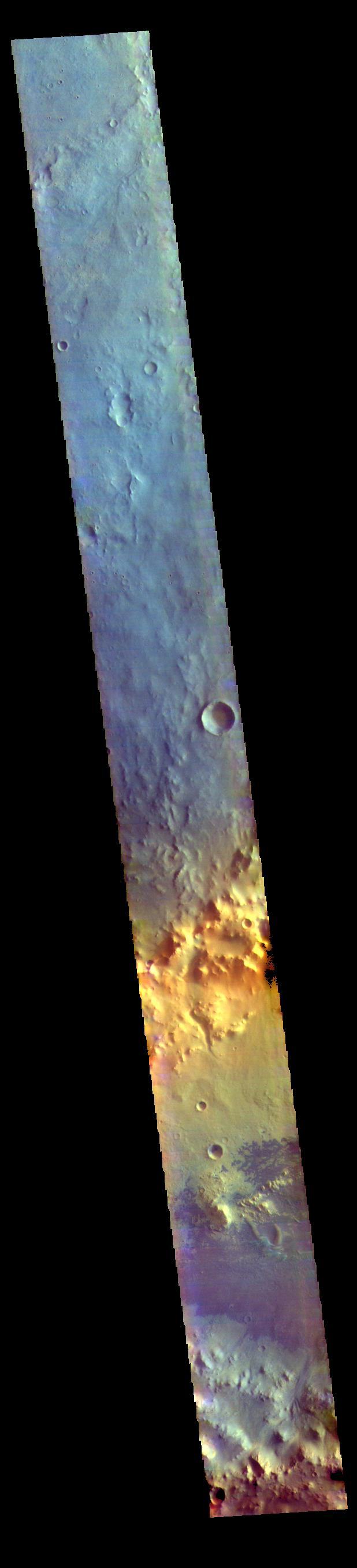 Today's VIS image is located in Arabia Terra. The crater at the bottom of the image contains a large region of sand dunes. Dark blue in this band configuration indicates basaltic sand.  The THEMIS VIS camera contains 5 filters. The data from different filters can be combined in multiple ways to create a false color image. These false color images may reveal subtle variations of the surface not easily identified in a single band image.  Orbit Number: 61563 Latitude: -6.83478 Longitude: 355.996 Instrument: VIS Captured: 2015-10-30 20:32  https://photojournal.jpl.nasa.gov/catalog/PIA23069