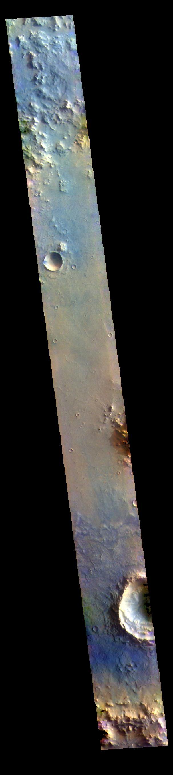 This VIS image is located in Arabia Terra.  The THEMIS VIS camera contains 5 filters. The data from different filters can be combined in multiple ways to create a false color image. These false color images may reveal subtle variations of the surface not easily identified in a single band image.  Orbit Number: 61900 Latitude: -8.73294 Longitude: 352.802 Instrument: VIS Captured: 2015-11-27 14:36  https://photojournal.jpl.nasa.gov/catalog/PIA23089