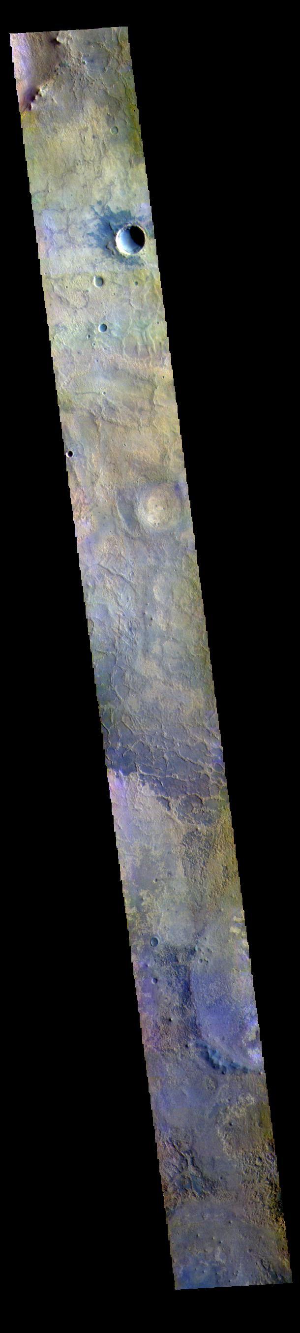 This VIS image shows part of Meridiani Planum. Meridiani Planum has been the home of the Opportunity MER rover since January 2004. The rover was last heard from at the start of the large dust storms during the summer of 2018. After many months trying to reestablish communications, the mission was declared over in February 2019. The rover covered over 25 miles of travel and provided new insights into the geology of Mars. Opportunity's original mission length was just 90 days, but it lasted 15 years! Good night Opportunity. For more information about Opportunity, and her sister, Spirit, visit https://mars.nasa.gov/mer/mission/overview/.  The THEMIS VIS camera contains 5 filters. The data from different filters can be combined in multiple ways to create a false color image. These false color images may reveal subtle variations of the surface not easily identified in a single band image.  Orbit Number: 61912 Latitude: 1.53921 Longitude: 5.18703 Instrument: VIS Captured: 2015-11-28 14:22  https://photojournal.jpl.nasa.gov/catalog/PIA23092