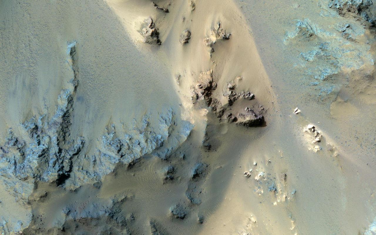 This long image is entirely over the extensive central peak complex of Hale Crater.  Of particular interest are bedrock outcrops and associated fine-grained sediments with different colors. This 153-kilometer diameter crater was named after American astronomer George Ellery Hale.   https://photojournal.jpl.nasa.gov/catalog/PIA23101