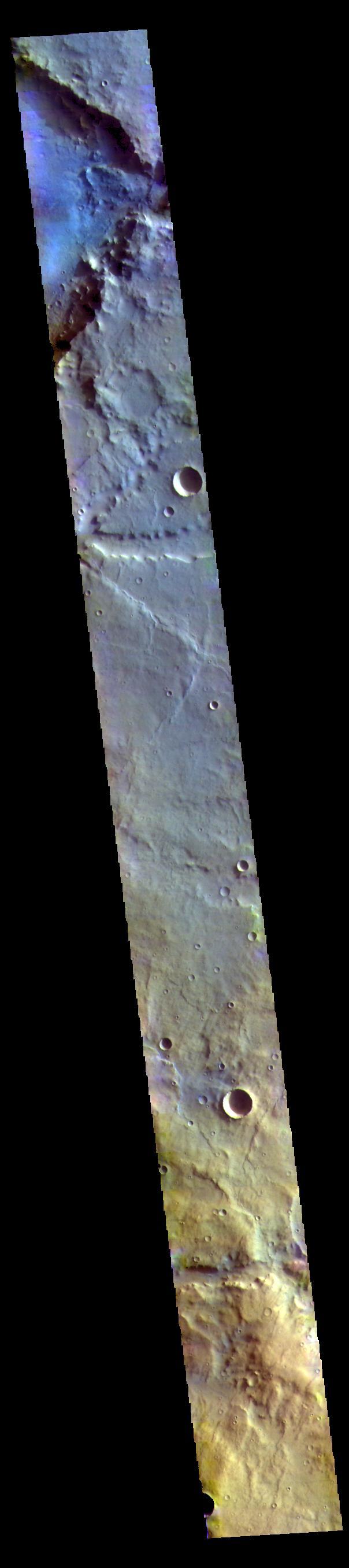 This image is located in northern Noachis Terra. Evros Vallis is located just below the large crater at the top of the image.  The THEMIS VIS camera contains 5 filters. The data from different filters can be combined in multiple ways to create a false color image. These false color images may reveal subtle variations of the surface not easily identified in a single band image.  Orbit Number: 62336 Latitude: -12.8197 Longitude: 12.5078 Instrument: VIS Captured: 2016-01-02 12:21  https://photojournal.jpl.nasa.gov/catalog/PIA23110
