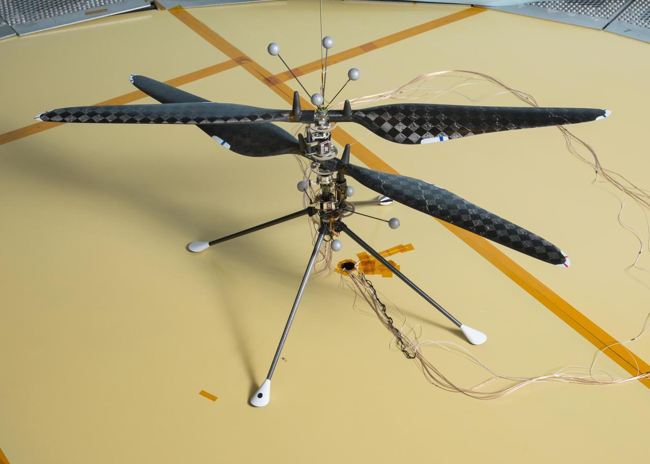 This image depicts the demonstration vehicle used to prove that controlled, and sustained flight is feasible in a Martian atmosphere. The first free flight of this prototype Mars Helicopter in atmospheric conditions similar to Mars occurred on May 31, 2016, inside the Space Simulator, a 25-foot-wide (7.62-meter-wide) vacuum chamber at NASA's Jet Propulsion Laboratory in Pasadena, Calif.  https://photojournal.jpl.nasa.gov/catalog/PIA23159