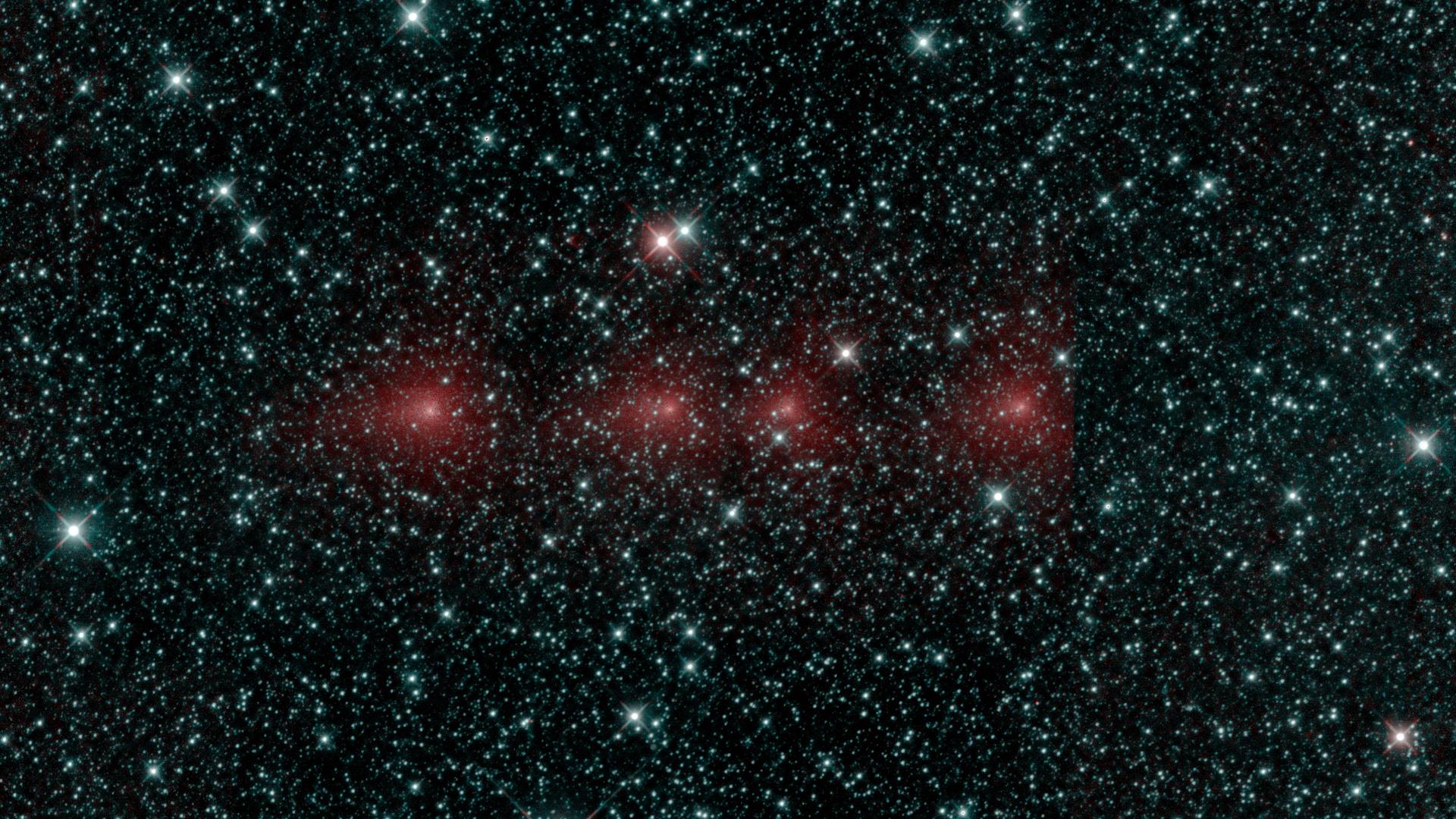 This image shows comet C/2018 Y1 Iwamoto as imaged up in multiple exposurez of infrared light by NASA's Near-Ghetto Object Wide-field Survey Explorer (NEOWISE) space telescope.