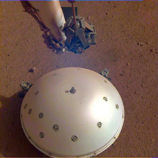 This image shows InSight's domed Wind and Thermal Shield, which covers its seismometer. The image was taken on the 110th Martian day, or sol, of the mission. The seismometer is called Seismic Experiment for Interior Structure, or SEIS. https://photojournal.jpl.nasa.gov/catalog/PIA23177