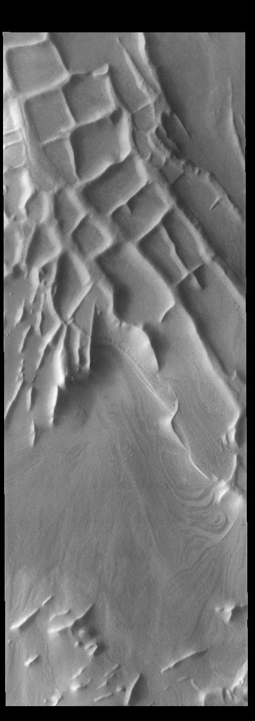 Angustus Labyrinthus is a unique region near the south polar cap. The squares formed by intersecting ridges have given the feature the informal name of Inca City. The linear ridges are believed to have formed by volcanic and tectonic forces, where magma filled fractures in the subsurface and then erosion revealed the magmatic material.  Orbit Number: 76172 Latitude: -81.2617 Longitude: 295.232 Instrument: VIS Captured: 2019-02-15 06:40  https://photojournal.jpl.nasa.gov/catalog/PIA23190