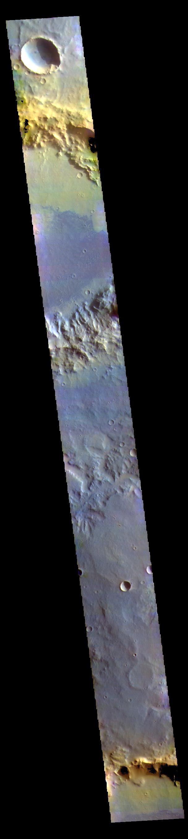 The THEMIS VIS camera contains 5 filters. The data from different filters can be combined in multiple ways to create a false color image. These false color images may reveal subtle variations of the surface not easily identified in a single band image. Today's false color image shows part of Noachis Terra. The large craters are unnamed, as is the channel in the center of the image. Dark blue tones in this false color image indicate basaltic sands.  Orbit Number: 63010 Latitude: -5.56102 Longitude: 2.22751 Instrument: VIS Captured: 2016-02-27 00:40  https://photojournal.jpl.nasa.gov/catalog/PIA23199