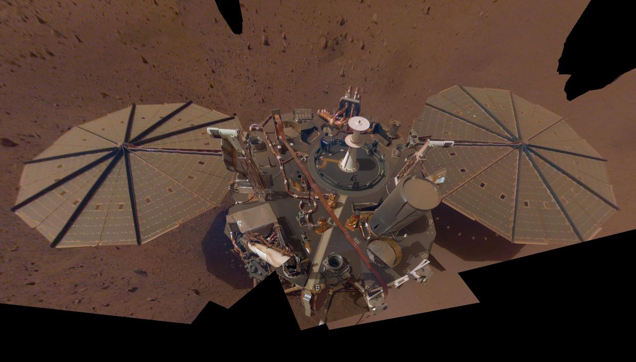 This is NASA InSight's second full selfie on Mars. Since taking its first selfie, the lander has removed its heat probe and seismometer from its deck, placing them on the Martian surface; a thin coating of dust now covers the spacecraft as well. This selfie is a mosaic made up of 14 images taken on March 15 and April 11 - the 106th and 133rd Martian days, or sols, of the mission - by InSight's Instrument Deployment Camera, located on its robotic arm. InSight's first selfie showed its instruments still on the deck. Now that they're removed, the viewer can see the spacecraft's air pressure sensor (white object in center), the tether box for its seismometer and the tether for its heat probe running across the deck. Also visible is its robotic arm and grapple. https://photojournal.jpl.nasa.gov/catalog/PIA23203