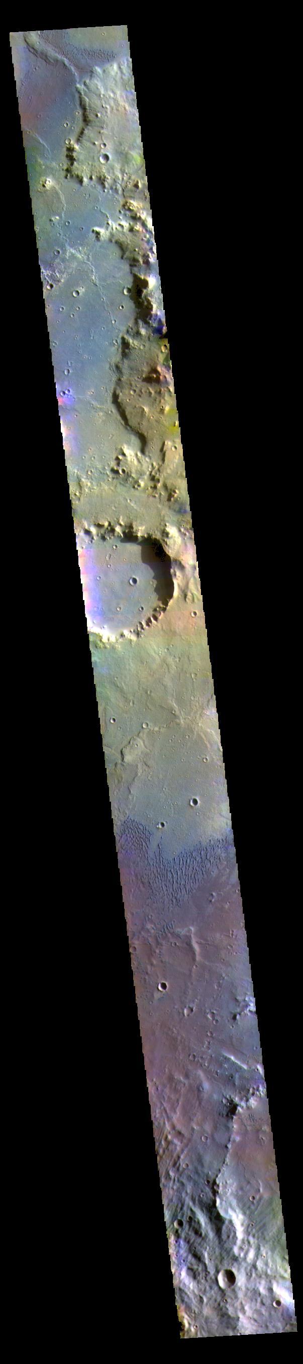 This false color image shows part of the floor of Herschel Crater.  The THEMIS VIS camera contains 5 filters. The data from different filters can be combined in multiple ways to create a false color image. These false color images may reveal subtle variations of the surface not easily identified in a single band image.  Orbit Number: 63542 Latitude: -15.0758 Longitude: 131.164 Instrument: VIS Captured: 2016-04-10 20:15  https://photojournal.jpl.nasa.gov/catalog/PIA23253