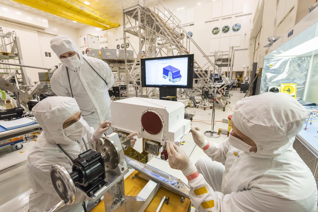 In this picture — taken on May 23, 2019, in the Spacecraft Assembly Facility's High Bay 1 clean room at the Jet Propulsion Laboratory in Pasadena, California — engineers re-install the cover to the remote sensing mast (RSM) head after integration of two Mastcam-Z high-definition cameras that will go on the Mars 2020 rover.  https://photojournal.jpl.nasa.gov/catalog/PIA23266
