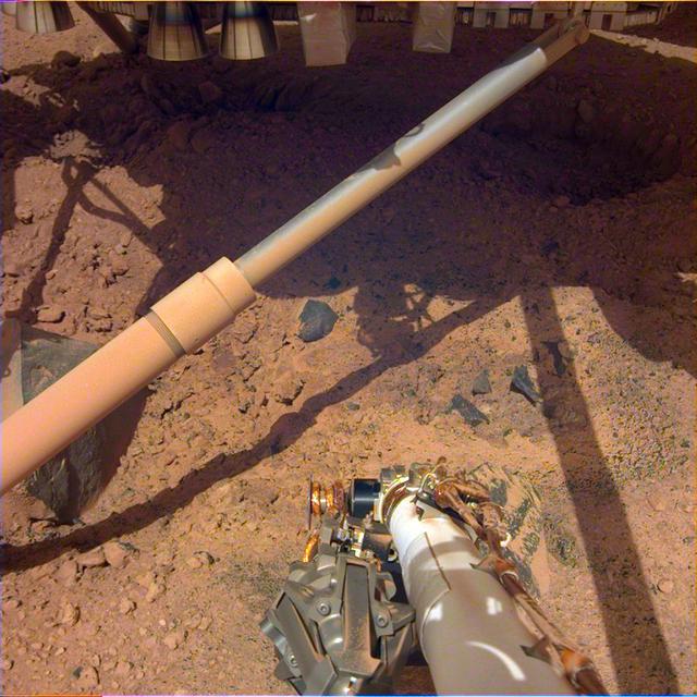 Thrusters under NASA's InSight lander churned up soil during landing on Mars. This image shows two pits excavated by the thrusters. https://photojournal.jpl.nasa.gov/catalog/PIA23301