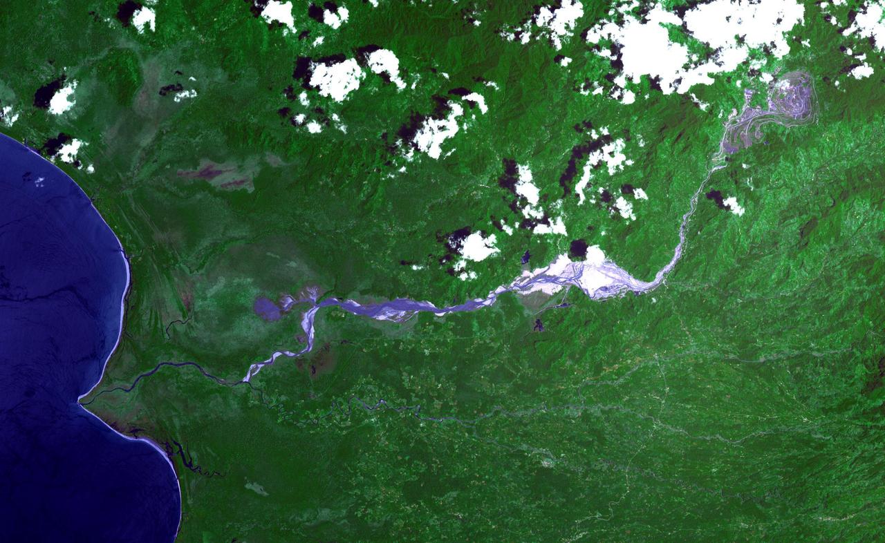 The Panguna copper ore deposit was discovered in 1969 in the Autonomous Region of Bougainville, Papua New Guinea. It has one of the largest reserves in the world, with 1 billion tons of copper and 12 million ounces of gold. In 1989 the then world's largest open pit copper-gold mine closed as a result of conflict between the mine owners and traditional land owners over the profits. The mine owners were also accused of poisoning the entire length of the Jaba River. The image was acquired November 12, 2013, covers an area of 24 by 39 kilometers, and is located at 6.3 degrees south, 155.5 degrees east.  https://photojournal.jpl.nasa.gov/catalog/PIA23338