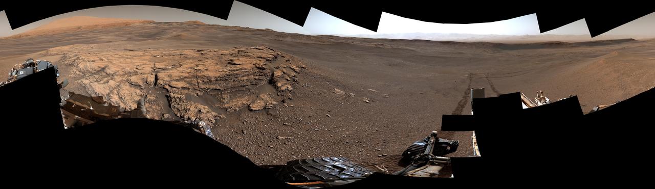 This 360-degree panorama of a location called "Teal Ridge" was captured on Mars by the Mast Camera, or Mastcam, on NASA's Curiosity rover on June 18, 2019, the 2,440th Martian day, or sol, of the mission.  By driving up the side of Teal Ridge, the rover was able to reach rocks from the second of three subunits within the "clay-bearing unit" that are exposed in a valley-like region of Mount Sharp, which Curiosity is ascending.  The scene is presented with a color adjustment that approximates white balancing to resemble how the rocks and sand would appear under daytime lighting conditions on Earth.  https://photojournal.jpl.nasa.gov/catalog/PIA23346