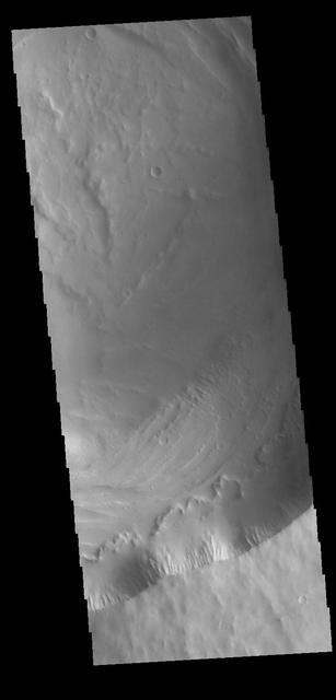 Today's VIS image shows Biblis Patera, the summit caldera of the volcano Biblis Tholus. This volcano is located west of Pavonis Mons and is just one of the numerous volcanoes found in the Tharsis region.  Orbit Number: 77870 Latitude: 2.21414 Longitude: 236.308 Instrument: VIS Captured: 2019-07-05 03:02  https://photojournal.jpl.nasa.gov/catalog/PIA23393