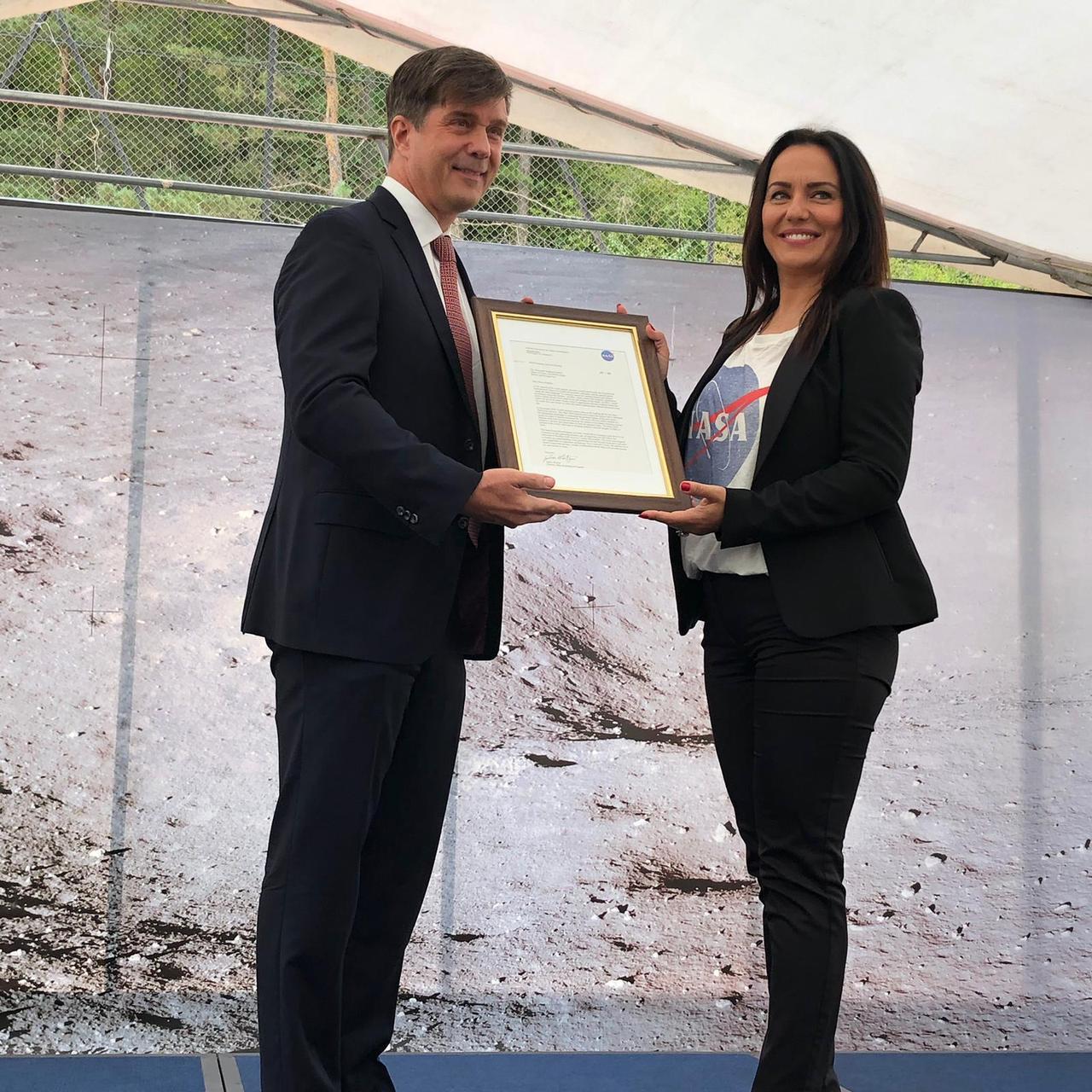 Eric Nelson, the U.S. Ambassador to Bosnia and Herzegovina, presents a framed letter to Snezana Ružičić, mayor of the Balkan municipality of Jezero. The letter, from NASA's director of Mars Exploration, James Watzin, honored the connection between the small Balkan town and Jezero Crater the landing site of NASA's upcoming Mars 2020 mission. https://photojournal.jpl.nasa.gov/catalog/PIA23464