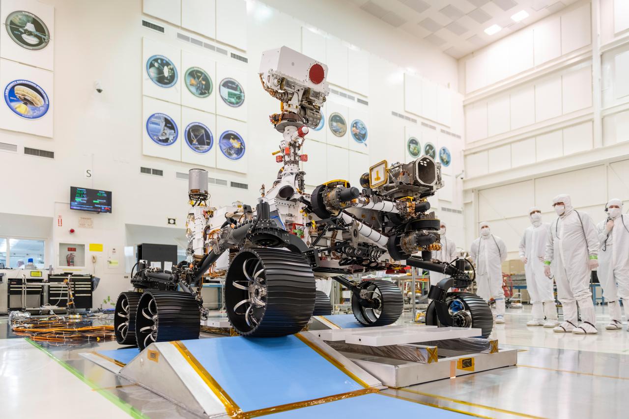In a clean room at NASA's Jet Propulsion Laboratory in Pasadena, California, engineers observed the first driving test for NASA's Mars 2020 rover on Dec. 17, 2019.  Scheduled to launch as early as July 2020, the Mars 2020 mission will search for signs of past microbial life, characterize Mars' climate and geology, collect samples for future return to Earth, and pave the way for human exploration of the Red Planet. It is scheduled to land in an area of Mars known as Jezero Crater on Feb. 18, 2021.  JPL is building and will manage operations of the Mars 2020 rover for NASA. NASA's Launch Services Program, based at the agency's Kennedy Space Center in Florida, is responsible for launch management.  For more information about the mission, go to https://mars.nasa.gov/mars2020/.   https://photojournal.jpl.nasa.gov/catalog/PIA23499