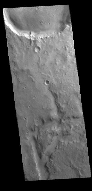 This VIS image shows a small section of an unnamed channel in Arabia Terra. This is just one of many channels dissecting the region. Orbit Number: 78702 Latitude: -4.98861 Longitude: 352.581 Instrument: VIS Captured: 2019-09-11 15:18 https://photojournal.jpl.nasa.gov/catalog/PIA23502