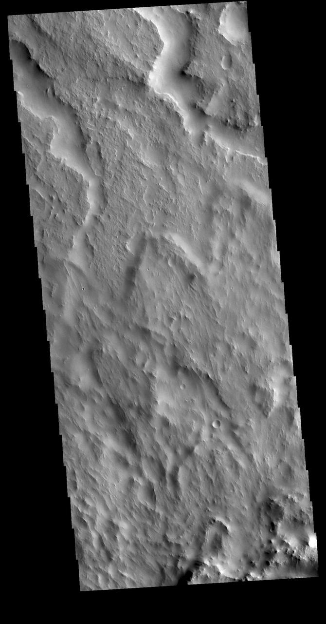 The two channels visible at the top of this image are tributaries of Indus Vallis. Ejecta from an unnamed crater south of this image fills the bottom half of the VIS image. Indus Vallis is located in Terra Sabaea. Orbit Number: 78850 Latitude: 18.178 Longitude: 39.5506 Instrument: VIS Captured: 2019-09-23 19:54 https://photojournal.jpl.nasa.gov/catalog/PIA23508