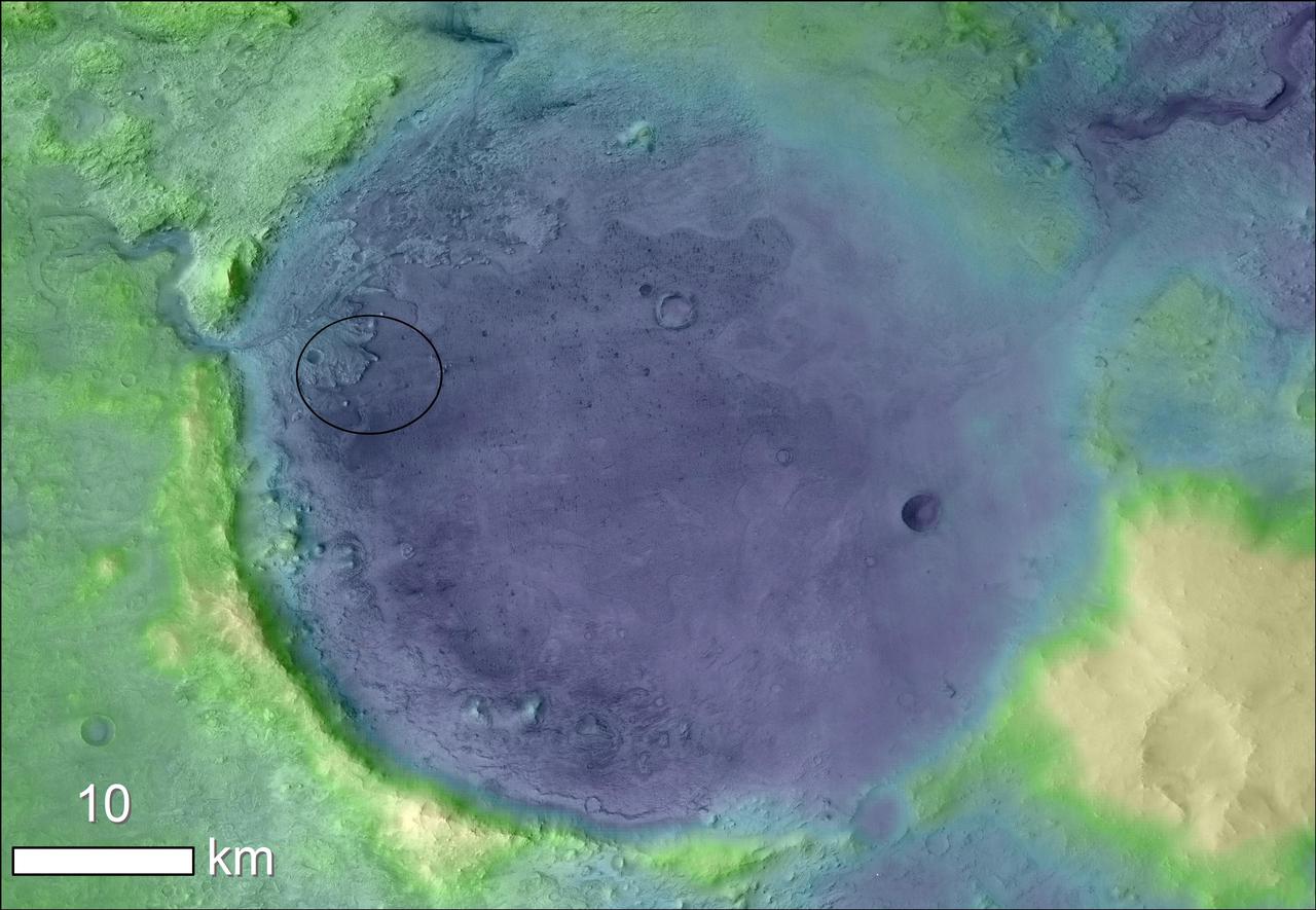 Lighter colors represent higher elevation in this image of Jezero Crater on Mars, the landing site for NASA's Mars 2020 mission. The oval indicates the landing ellipse, where the rover will be touching down on Mars. The color added to this image helps the crater rim stand out clearly, and makes it easier to spot the shoreline of a lake that dried up billions of years ago.  Scientists want to visit this shoreline because it may have preserved fossilized microbial life, if any ever formed on Mars.  The image was created using data from a combination of instruments and spacecraft: NASA's Mars Global Surveyor and its Mars Orbiter Laser Altimeter (MOLA); NASA's Mars Reconnaissance Orbiter and its Compact Reconnaissance Imaging Spectrometer for Mars (CRISM) and Context Camera (CTX); and the European Space Agency's Mars Express and its High Resolution Stereo Camera (HRSC).  https://photojournal.jpl.nasa.gov/catalog/PIA23511