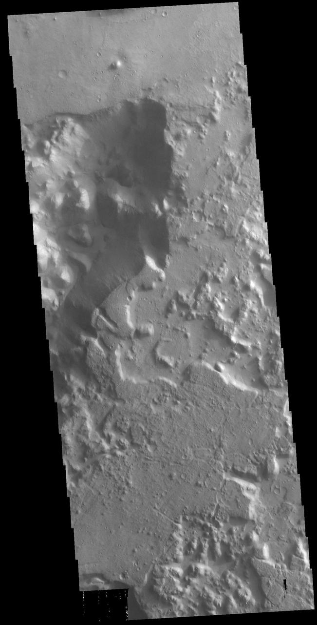 This VIS image shows a region of chaos near the terminal end of Morava Valles. Located in Margaritifer Terra, Morava Valles is one of several channels that empty northward towards Chryse Planitia. Morava Valles arises from a region of chaos. Chaos terrain is also found along the course of the channel and may occur where the channel flow fluid warmed the subsurface ice creating additional release points for melted subsurface ice. Chaos terrain is typified by regions of blocky, often steep sided, mesas interspersed with deep valleys. With time and erosion the valleys widen and the mesas become smaller. It has been proposed that a catastrophic outflow of subsurface water creates the chaos and provides the surface flow creating the channel.  Orbit Number: 79002 Latitude: -11.1516 Longitude: 338.097 Instrument: VIS Captured: 2019-10-06 08:08  https://photojournal.jpl.nasa.gov/catalog/PIA23541