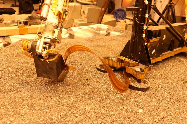 NASA image: Robotic Arm Pushes on a Model of the Mole