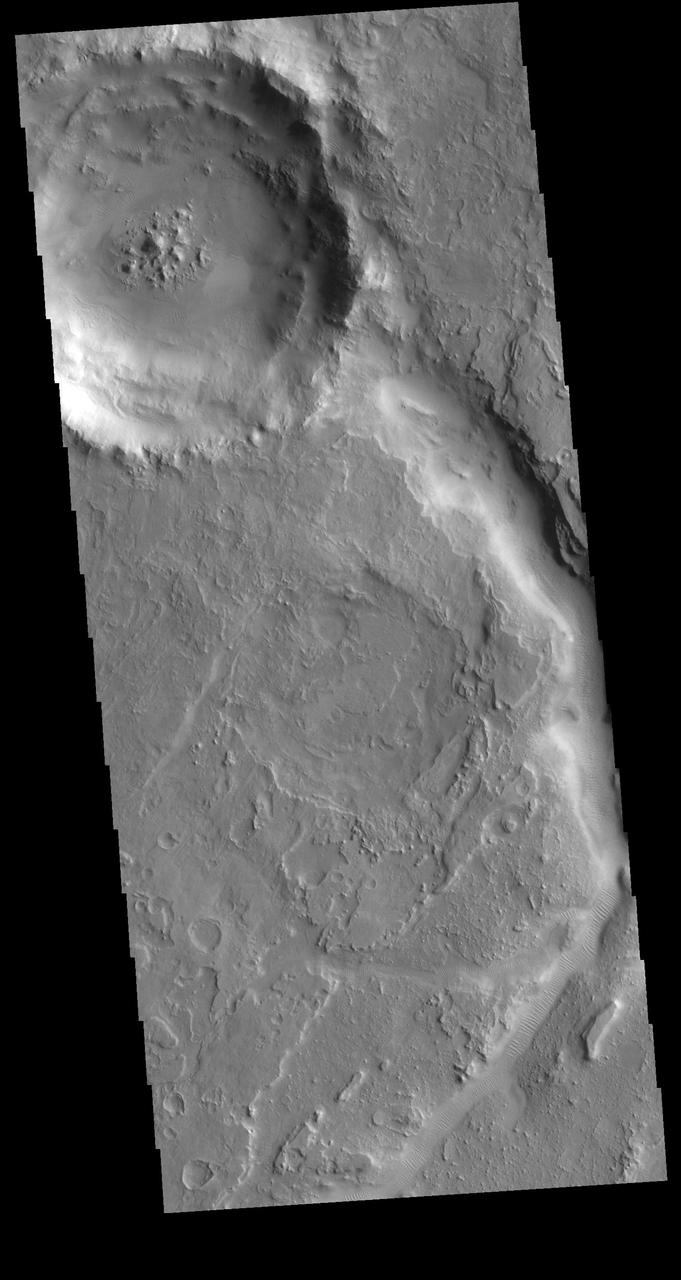 The channel in today's VIS image is called Auqakuh Vallis. Large channels on Mars are named for the word "mars/star" in different languages on Earth, small channels are named for rivers on Earth. "Auqakuh" is the word "mars" in Quechua (Inca).  Orbit Number: 79261 Latitude: 29.0373 Longitude: 60.3106 Instrument: VIS Captured: 2019-10-27 16:12  https://photojournal.jpl.nasa.gov/catalog/PIA23659