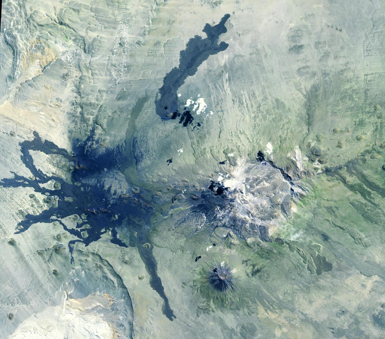 Payun Matru is a large shield volcano capped by a caldera (right half of image), located in the Andean Volcanic Belt in Argentina. Nearby to the south is the high compound volcano Payun; to the west is a field of cinder cones and lava flows. The most recent volcanic activity occurred about 500 years ago. The image was acquired March 1, 2009, covers an area of 46.7 by 53.1 km, and is located at 36.4 degrees south, 69.3 degrees west.  https://photojournal.jpl.nasa.gov/catalog/PIA23670