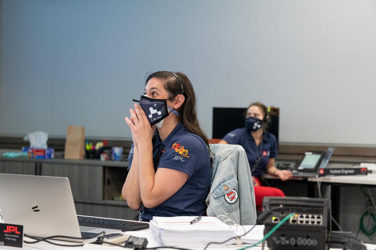 Engineer Mallory Lefland experienced the tension and relief shared by the team on Mars 2020 Perseverance landing day, on Feb. 18, 2021. She watched the dramatic entry, descent, and landing from inside a mission support area at NASA's Jet Propulsion Laboratory in Southern California. JPL built and manages operations of the Mars 2020 Perseverance rover for NASA. A key objective for Perseverance's mission on Mars is astrobiology, including the search for signs of ancient microbial life. The rover will characterize the planet's geology and past climate, pave the way for human exploration of the Red Planet, and be the first mission to collect and cache Martian rock and regolith (broken rock and dust). Subsequent NASA missions, in cooperation with ESA (European Space Agency), would send spacecraft to Mars to collect these sealed samples from the surface and return them to Earth for in-depth analysis. The Mars 2020 mission is part of a larger program that includes missions to the Moon as a way to prepare for human exploration of the Red Planet. https://photojournal.jpl.nasa.gov/catalog/PIA23722