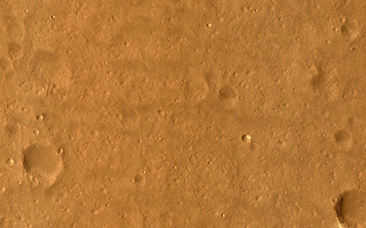 This image samples the smooth plains within one of the areas being considered for setting down China's lander and rover, expected to launch in 2020. While smooth on large scales, HiRISE reveals small-scale roughness elements, including craters, boulders, and other features. Such hazards may be avoided by using "terminal hazard avoidance," a technology China has demonstrated on the Moon. Utopia Planitia may have been extensively resurfaced by mud flows, so it is an interesting place to investigate potential past subsurface habitability. https://photojournal.jpl.nasa.gov/catalog/PIA23739