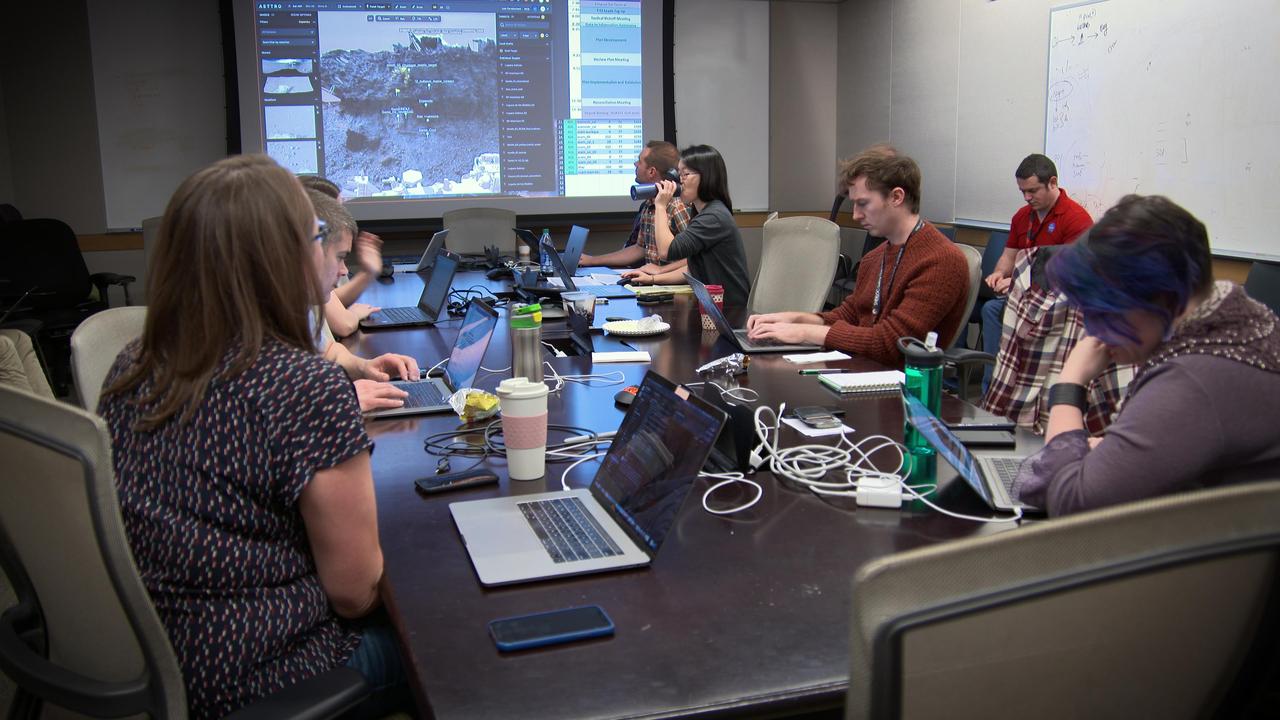 Scientists at NASA's Jet Propulsion Laboratory participate in a training exercise in February 2020. They reviewed images and data sent by a field team in the Nevada desert, discussing where to send their simulated "rover" next.  https://photojournal.jpl.nasa.gov/catalog/PIA23780