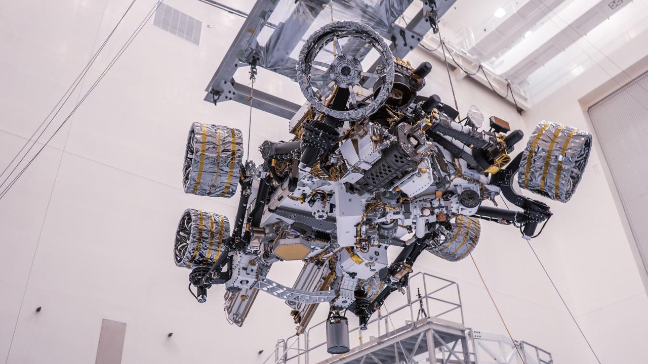NASA's Perseverance rover is moved during a test of its mass properties at Kennedy Space Center in Florida. The image was taken on April 7, 2020. https://photojournal.jpl.nasa.gov/catalog/PIA23829