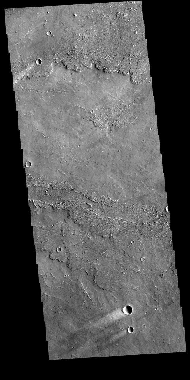 Today's VIS image shows several windstreaks on lava plains southwest of Arsia Mons. The extensive lava flow field is called Daedalia Planum.  Orbit Number: 80603 Latitude: -14.064 Longitude: 230.438 Instrument: VIS Captured: 2020-02-15 03:58  https://photojournal.jpl.nasa.gov/catalog/PIA23842