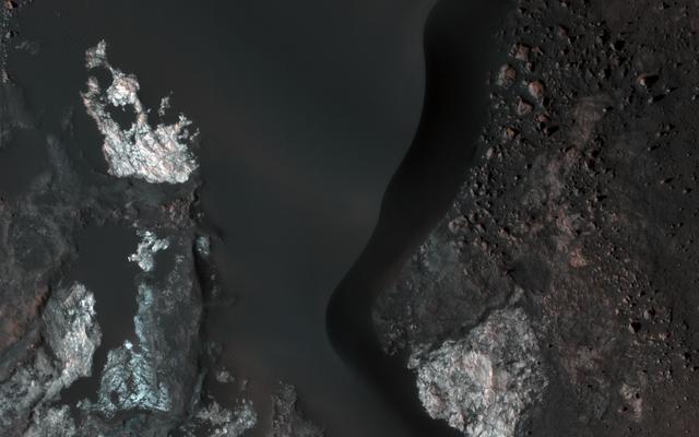 NASA image: Colorful Bedrock in a Northern Plains Crater