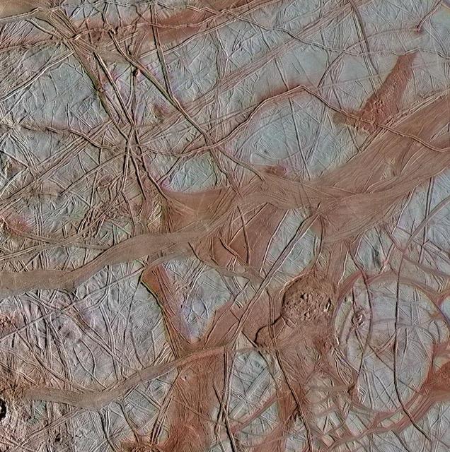 The surface of Jupiter's moon Europa features a widely varied landscape, including ridges, bands, small rounded domes and disrupted spaces that geologists called "chaos terrain." This newly reprocessed image, along with two others along the same longitude (see PIA23871 and PIA23873), were taken by NASA's Galileo spacecraft on Sept. 26, 1998, and reveal details of diverse surface features on Europa. All three images were captured along the same longitude of Europa as Galileo flew by on Sept. 26, 1998, in the spacecraft's 17th orbit of Jupiter (orbit E17). It was the eighth of Galileo's 11 targeted flybys of Europa. High-resolution images were taken through a clear filter in grayscale (black and white). Using lower-resolution, color images of the same region from a different flyby (orbit E14), technicians recently mapped color onto the higher-resolution images. (Orbit E14 resulted in this global view of Europa (see PIA19048). The color information gathered on that flyby was used to reprocess these new images.) Enhanced-color images like these allow scientists to highlight geologic features with different colors, which are related to chemical compositions of the surface. Areas that appear light blue or white are made up of relatively pure water ice, and reddish areas have more non-ice materials. This image shows a region of Europa's surface covered with ridges and bands, with a few small disrupted chaos regions. The long, linear ridges and bands that crisscross Europa's surface are thought to be related to the response of Europa's icy surface crust as it is stretched and pulled by Jupiter's strong gravity. Ridges, a common surface feature type, may form when a crack in the surface opens and closes repeatedly, building up a feature that's typically a few hundred yards tall, a few miles wide and that can stretch horizontally for thousands of miles. In contrast, bands are locations where a crack appears to have continued pulling apart horizontally, producing large, wide, relatively flat features. This image shows both ridges and bands, which interact with each other in complex ways that are somewhat similar to tectonic activity on the Earth. The image resolution is 244 yards (223 meters) per pixel, and this image depicts an area about 180 miles (285 kilometers) across. This image was produced by Mario Valenti at the SETI Institute in Mountain View, Calif. https://photojournal.jpl.nasa.gov/catalog/PIA23872