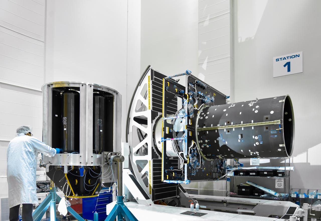 The main body of NASA's Psyche spacecraft, called the Solar Electric Propulsion (SEP) Chassis, is in a clean room at Maxar Technologies in Palo Alto, California, where a technician prepares to integrate part of the electric propulsion system onto the chassis. Maxar will deliver the SEP Chassis to NASA's Jet Propulsion Laboratory in Southern California in February 2021.  Set to launch in August 2022, Psyche's will explore a metal-rich asteroid of the same name that lies in the main asteroid belt between Mars and Jupiter. The spacecraft will arrive in early 2026, and orbit the asteroid for nearly two years to investigate its composition.   https://photojournal.jpl.nasa.gov/catalog/PIA23877