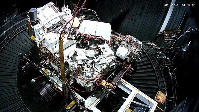 This animated GIF shows the deployment of the Perseverance rover's remote sensing mast during a cold test in a space simulation chamber at NASA's Jet Propulsion Laboratory. The test took place in October 2019.  Movie available at https://photojournal.jpl.nasa.gov/catalog/PIA23889