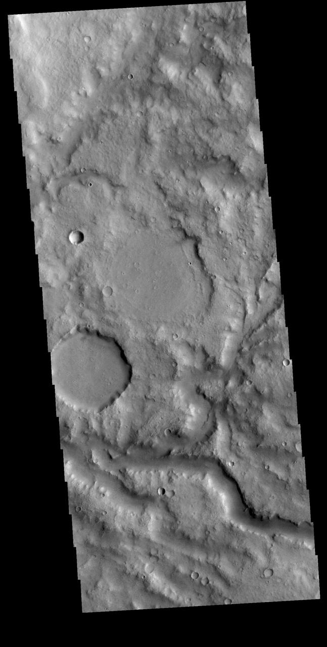 This VIS image shows a section of an unnamed channel in Terra Cimmeria.  Orbit Number: 81393 Latitude: -9.10693 Longitude: 118.856 Instrument: VIS Captured: 2020-04-20 05:09  https://photojournal.jpl.nasa.gov/catalog/PIA23958