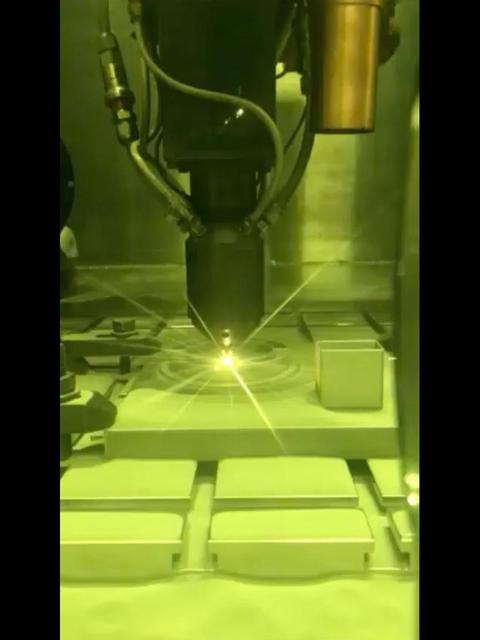 This video clip shows a 3D printing technique where a printer head scans over each layer of a part, blowing metal powder that is melted by a laser. It's one of several ways parts are 3D printed at NASA's Jet Propulsion Laboratory, but was not used to create the parts aboard the Perseverance rover.  Movie available at https://photojournal.jpl.nasa.gov/catalog/PIA23972
