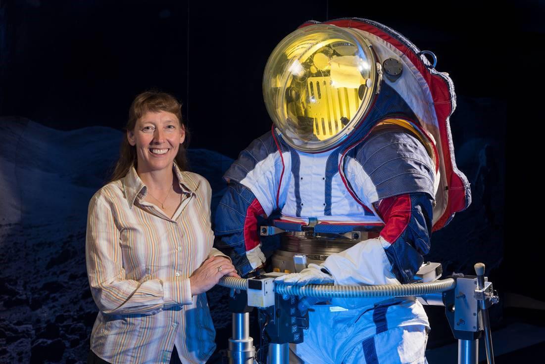 Advanced spacesuit designer Amy Ross of NASA's Johnson Space Center stands with the Z-2, a prototype spacesuit.