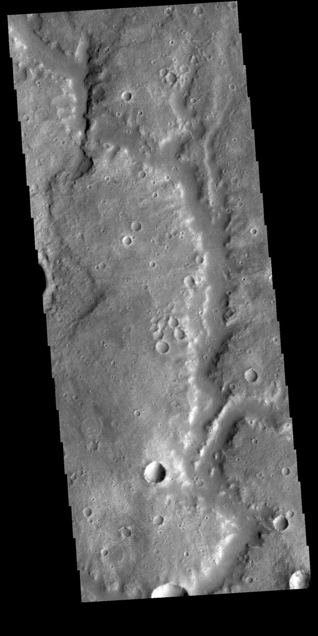This VIS image shows a section of Vichada Valles. Vichada Valles is located in Tyrrhena Terra and is over 430km long (267miles). Orbit Number: 81756 Latitude: -18.8291 Longitude: 87.9863 Instrument: VIS Captured: 2020-05-20 02:26 https://photojournal.jpl.nasa.gov/catalog/PIA24011